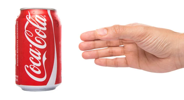 Griff nach Coca Cola — Stockfoto