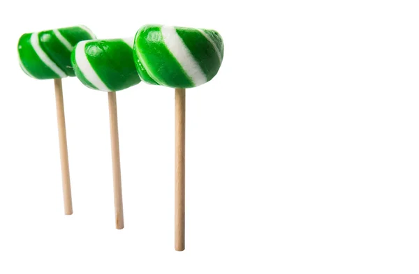 Grüne Wirbel Pfefferminzbonbons Über Weißem Hintergrund — Stockfoto