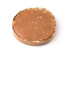 Beyaz arka plan üzerinde yuvarlak palm şeker