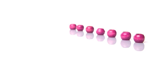 Perline di legno rosa — Foto Stock