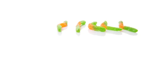 Grüne und orangefarbene Zuckergelee Bonbonstreifen — Stockfoto