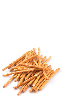 Brown, lezzetli simit beyaz arka plan üzerinde sopa.