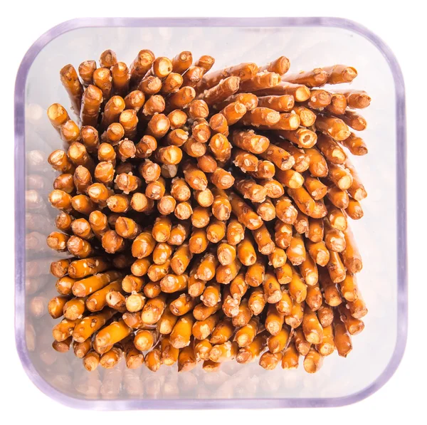 Brown Delicious Pretzel Sticks Plastic Container White Background — Stock Photo, Image