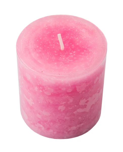 粉红色彩色芳香蜡烛在白色背景下 免版税图库图片