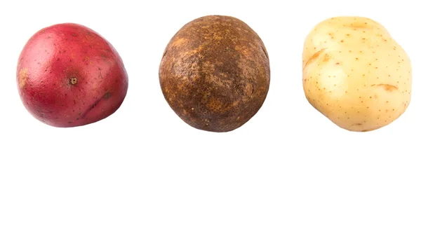 Κόκκινο, καφέ, κίτρινο πατάτες — Φωτογραφία Αρχείου
