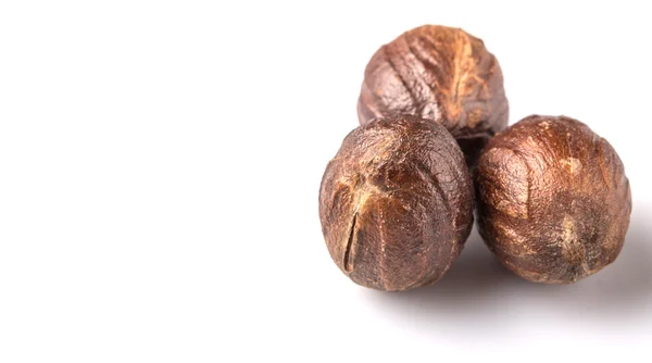 Nutmeg Atas Latar Belakang Putih — Stok Foto