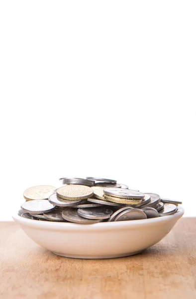 Malaysian Coins White Bowl Wooden Surface Royalty Free Stock Images
