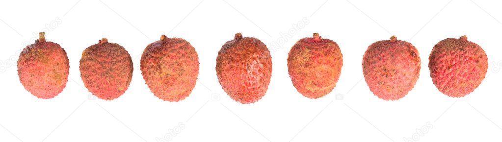Ripe lychee fruits over white background