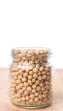 mason kavanoza ahşap arka plan üzerinde kırmızı barbunya fasulyesi