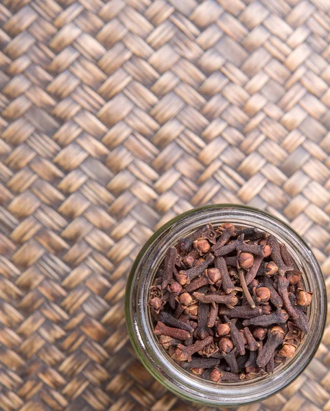 Clove Spices Mason Jar Wicker Background — Stock Photo, Image