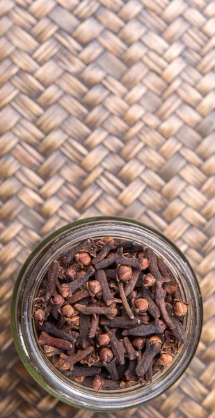 Clove Spices Mason Jar Wicker Background — Stock Photo, Image