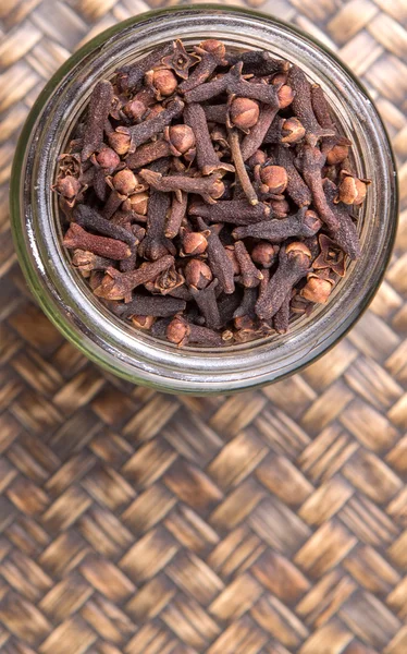 Clove Spices Mason Jar Wicker Background — Stock Photo, Image