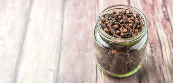 Clove Spice Mason Jar Weathered Wooden Background — Stock Photo, Image