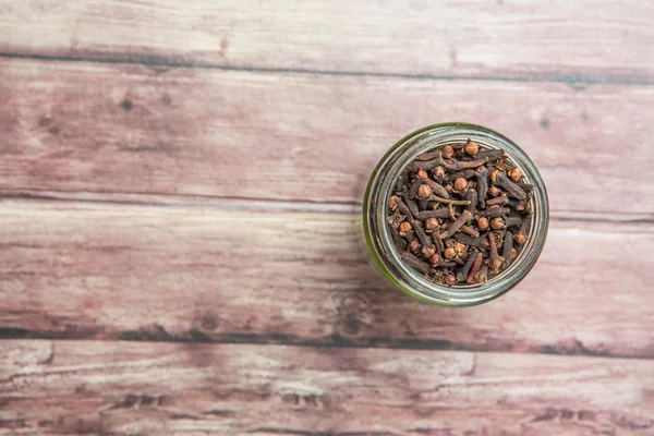 Clove Spice Mason Jar Weathered Wooden Background — Stock Photo, Image