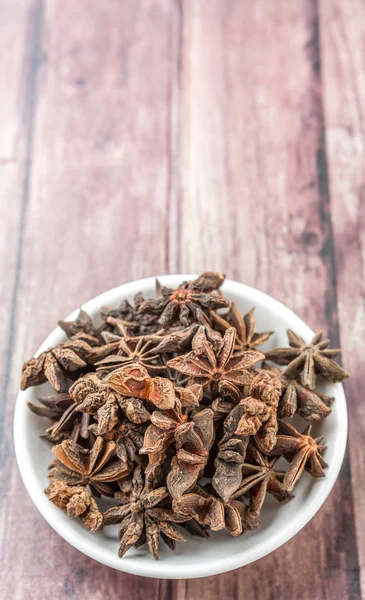 Star Anise Spices White Bowl Weathered Wooden Background — Stock Photo, Image