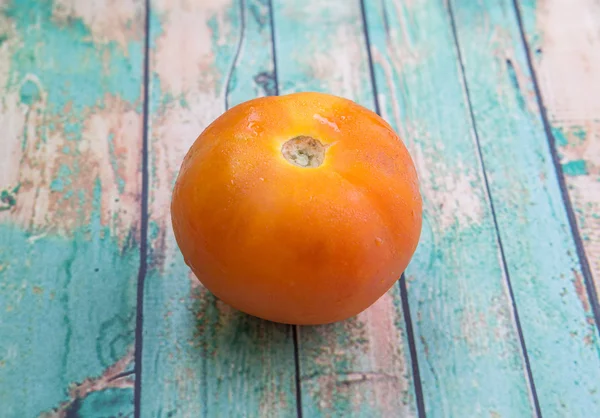 Orange Tomato Weathered Wooden Background — Stock Photo, Image
