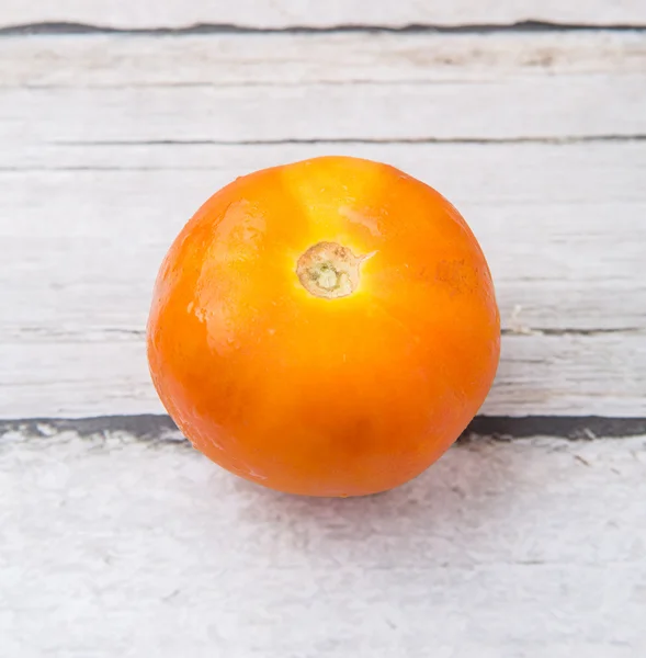 Orange Tomato Weathered Wooden Background — Stock Photo, Image