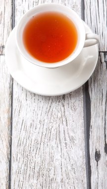 Çay yıpranmış arka plan üzerinde