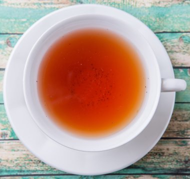 Çay yıpranmış arka plan üzerinde