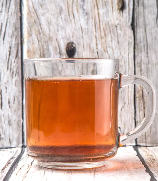 Tea Over Weathered Wooden Background — Stock Photo, Image