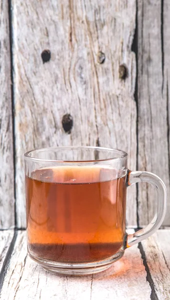 Tea Over Weathered Wooden Background — Stock Photo, Image