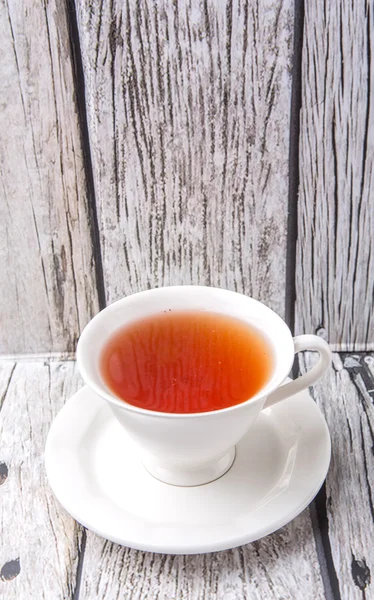 Tee auf verwittertem Hintergrund Stockfoto