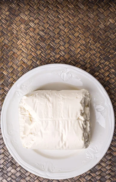 Un blocco di crema di formaggio — Foto Stock