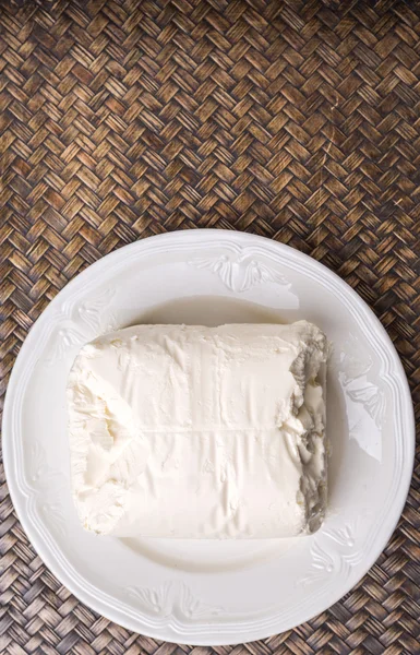 Un bloque de queso crema — Foto de Stock