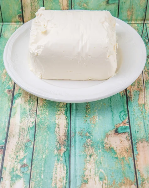 Krem peyniri bir blok — Stok fotoğraf