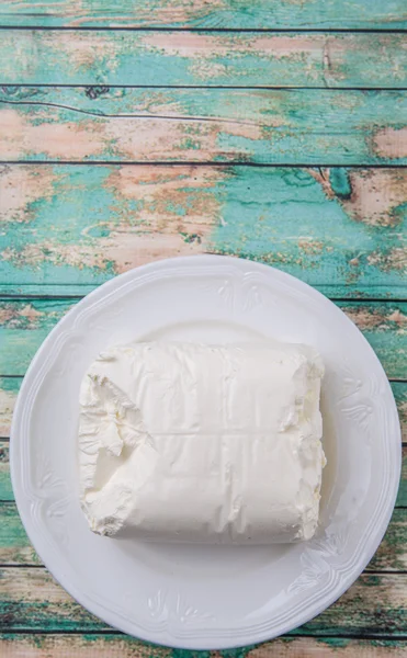 Un blocco di crema di formaggio — Foto Stock