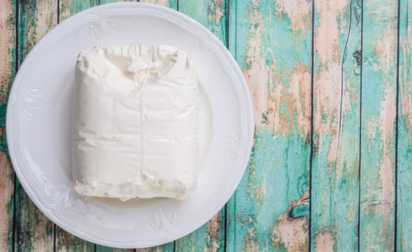 Un blocco di crema di formaggio — Foto Stock