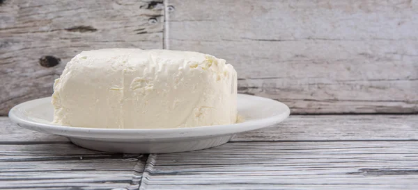 Un blocco di crema di formaggio — Foto Stock