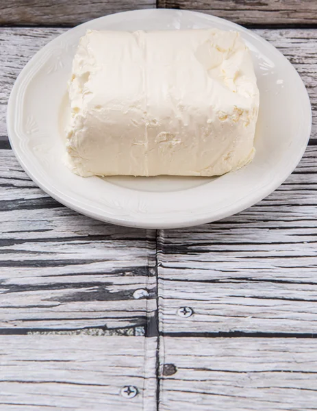 Un blocco di crema di formaggio — Foto Stock