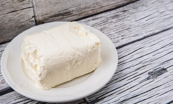 Un blocco di crema di formaggio — Foto Stock