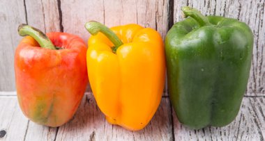 Fresh Colorful Bell Peppers clipart