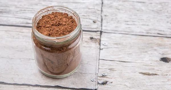 Polvo Cacao Puro Marrón Frasco Albañil Sobre Fondo Rústico Madera —  Fotos de Stock