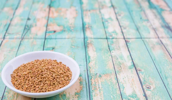 Fenugreek seeds in bowl — Stock Photo, Image