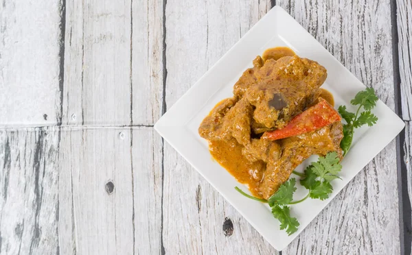 Curry de cordero en plato blanco — Foto de Stock