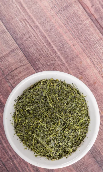 Hojas de té verde seco —  Fotos de Stock