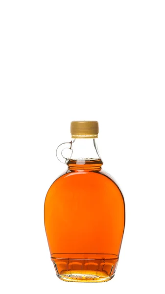 Кленовый сироп в бутылке — стоковое фото