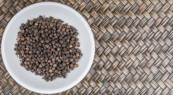 Black Peppercorn In White Bowl — Stock Photo, Image