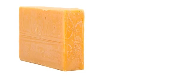 Egy blokk Cheddar sajt — Stock Fotó