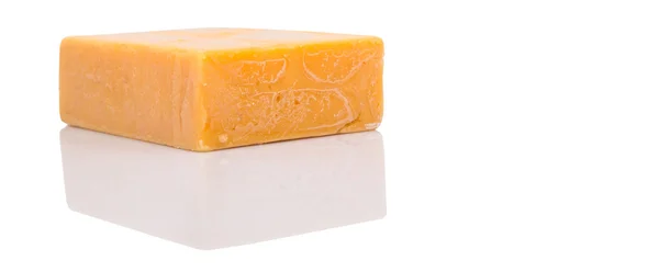 Un bloque de queso cheddar —  Fotos de Stock