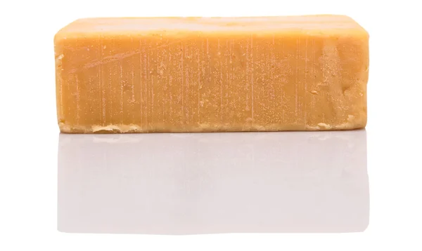 Un blocco di formaggio Cheddar — Foto Stock