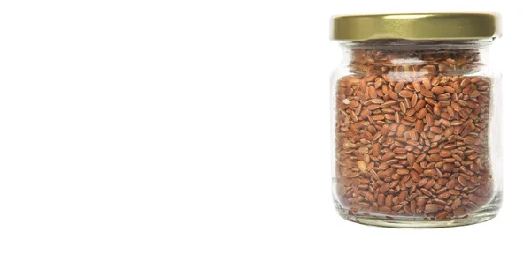 Brown millet in a jar — Stock Photo, Image