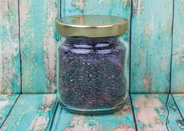 Black millet in a jar — Stock Photo, Image