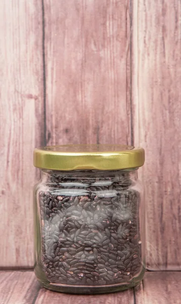 Black millet in a jar — Stock Photo, Image