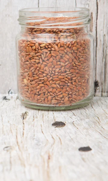 Brown millet in a jar — Stock Photo, Image