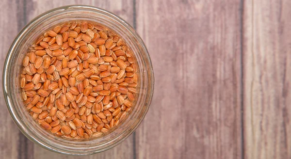 Brown millet in a jar — Stock Photo, Image