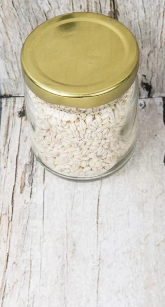 White millet in mason jar — Stock Photo, Image